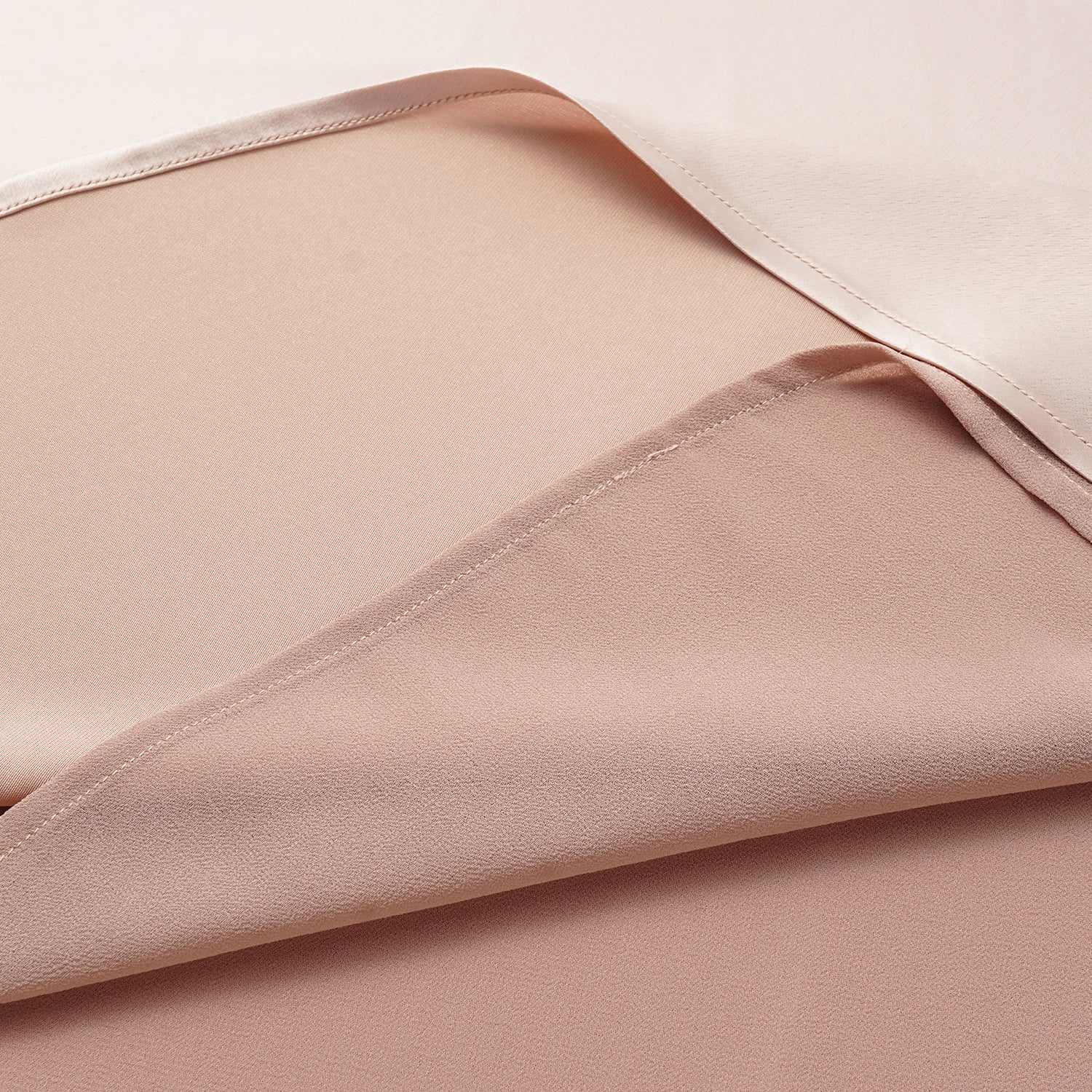 “Daytime sparkle.” Satin draped below-the-knee skirt—nude pink 